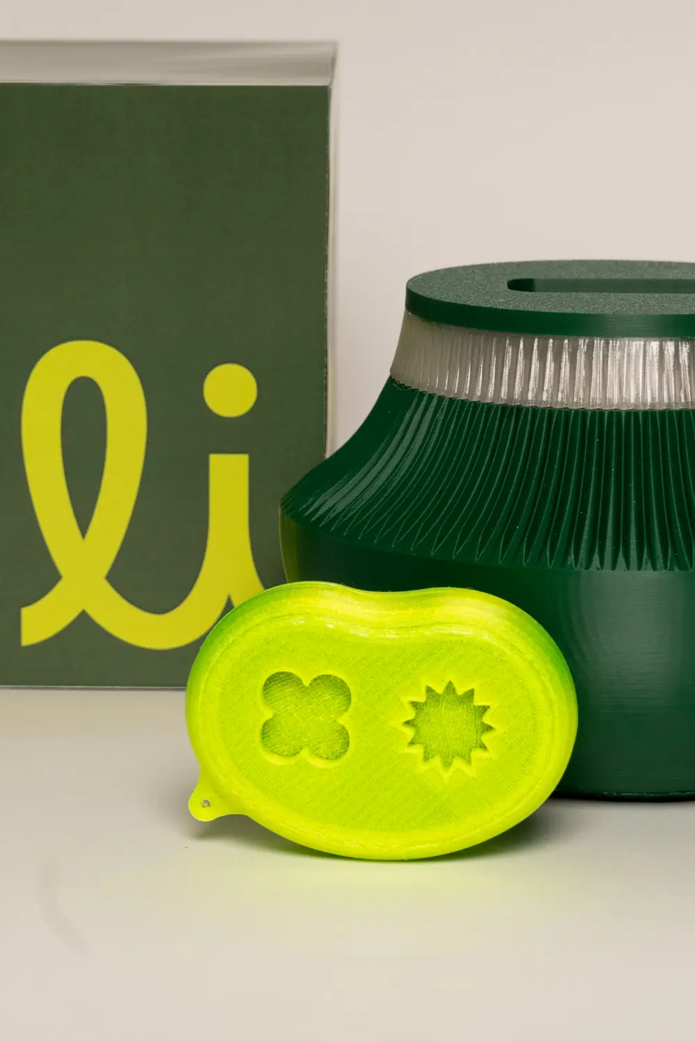 portable device shaped like a seed and its base